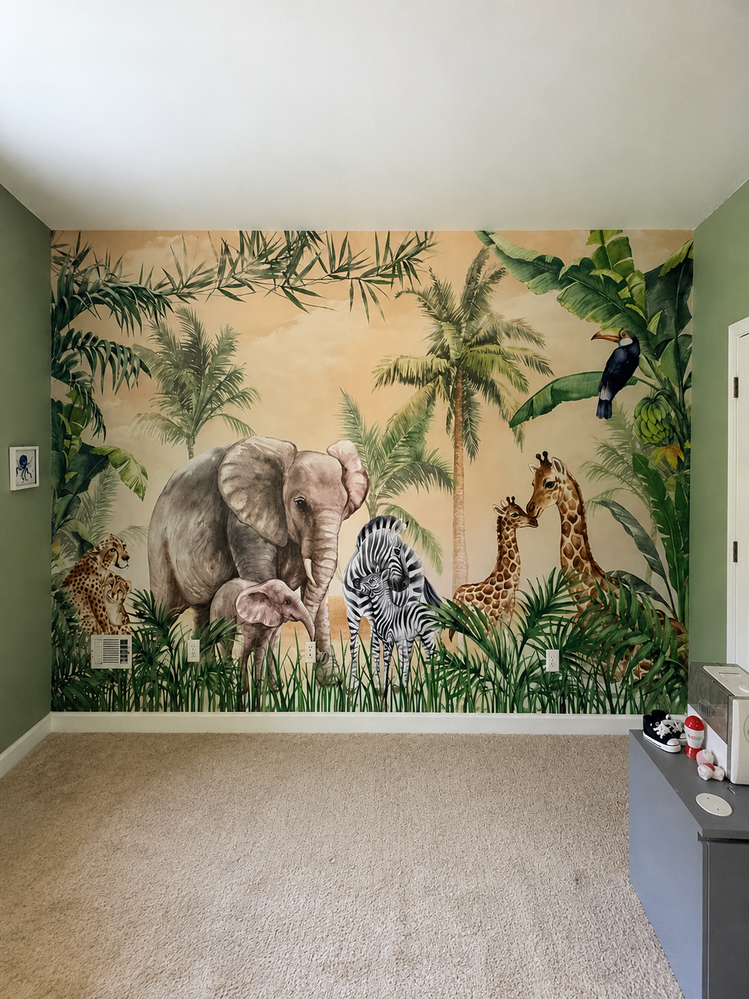 Jungle animals mural wallpaper installed in a child's bedroom in Atlanta, GA